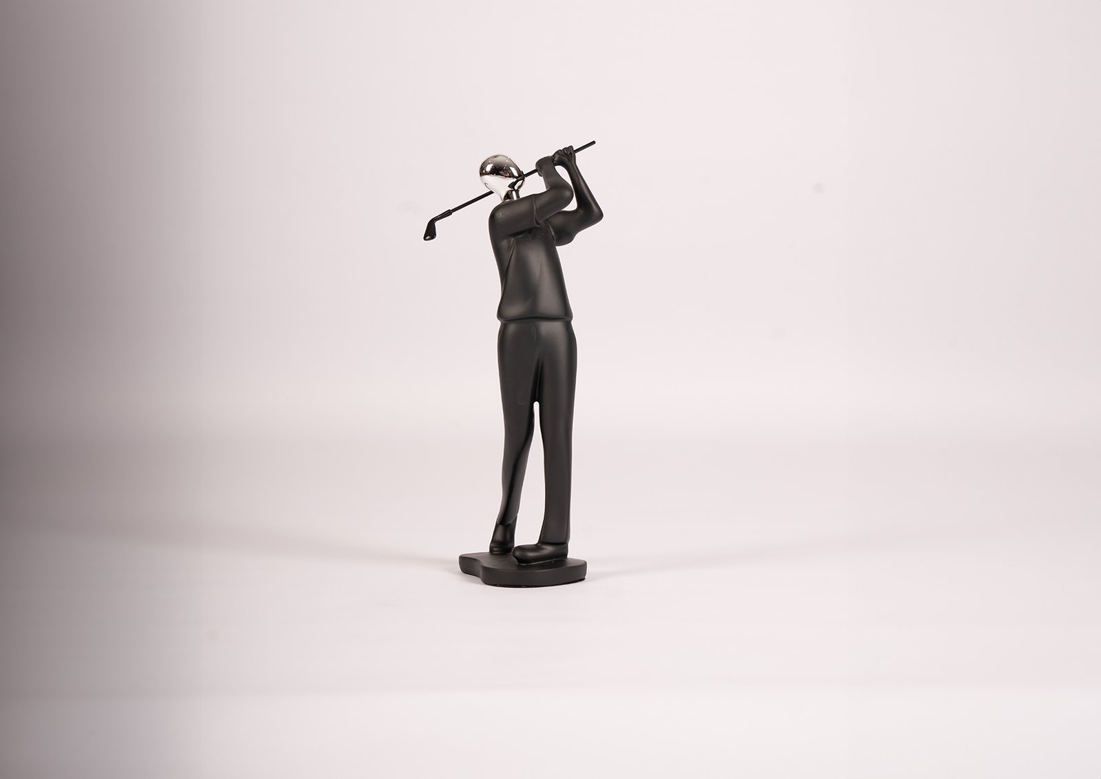 Sculpture de golfeur